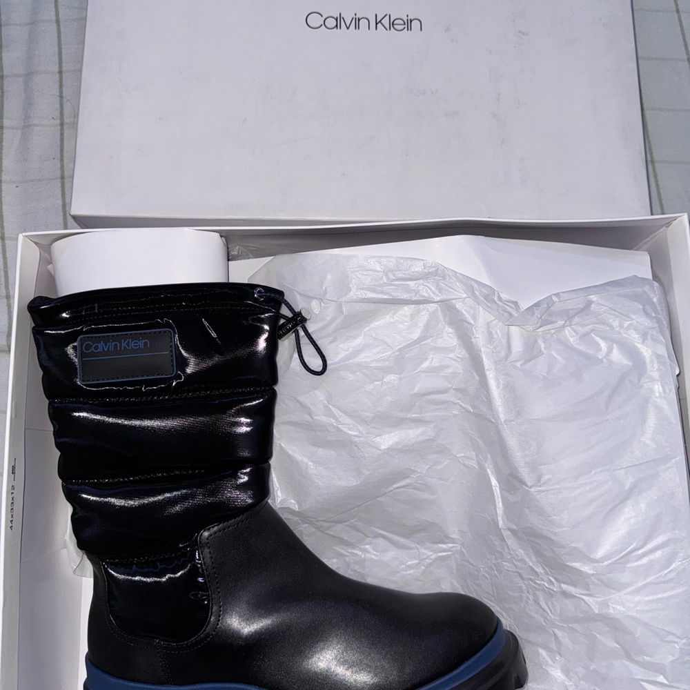 Calvin Klein Shiny Black Boots with Blue Accent